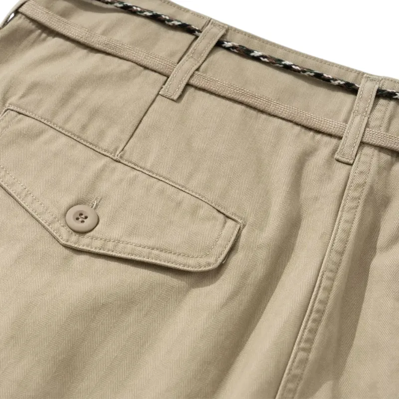 Relaxed fit pleated herringbone chino pant